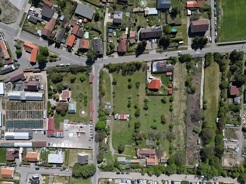 Prodej stavebního pozemku 742 m², Bašť – náhled fotky 1