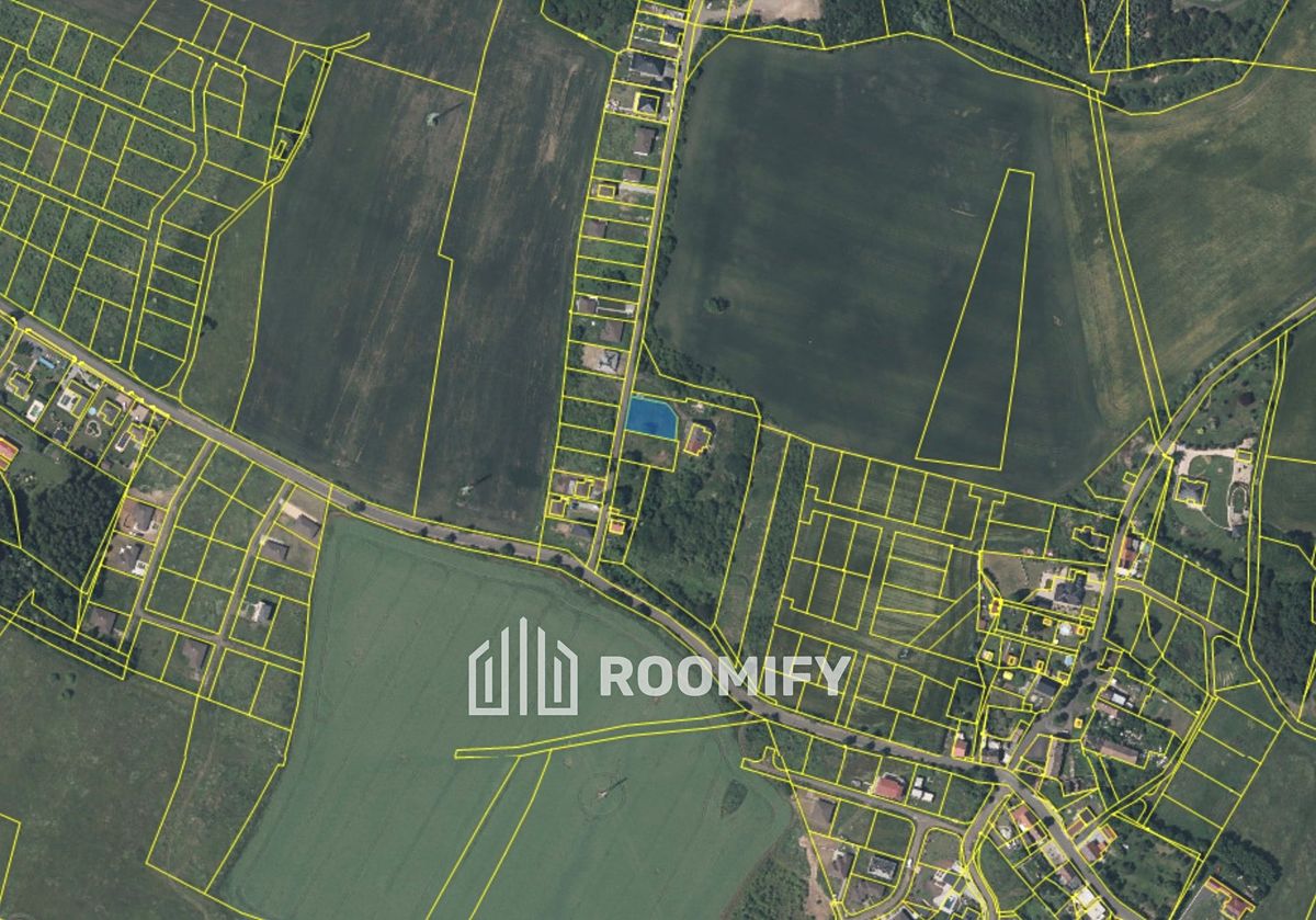 Prodej stavebního pozemku 814 m², Modlany – fotka 1 z 3