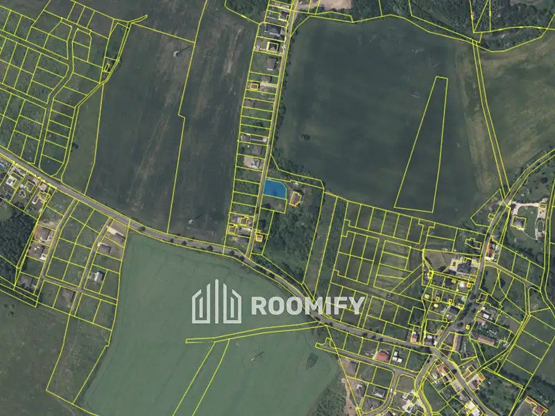 Prodej stavebního pozemku 814 m², Modlany – náhled fotky 1
