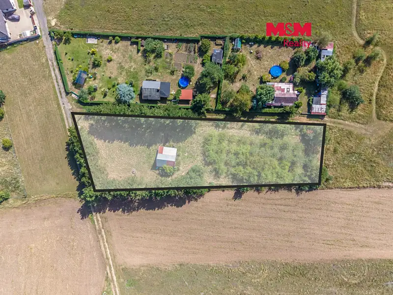 Prodej stavebního pozemku 2434 m², Křenek – náhled fotky 1