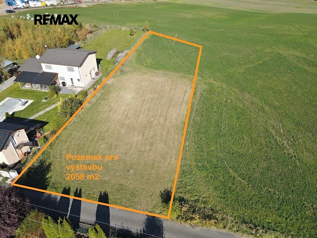 Prodej stavebního pozemku 2058 m², Pyšely – fotka 1 z 3