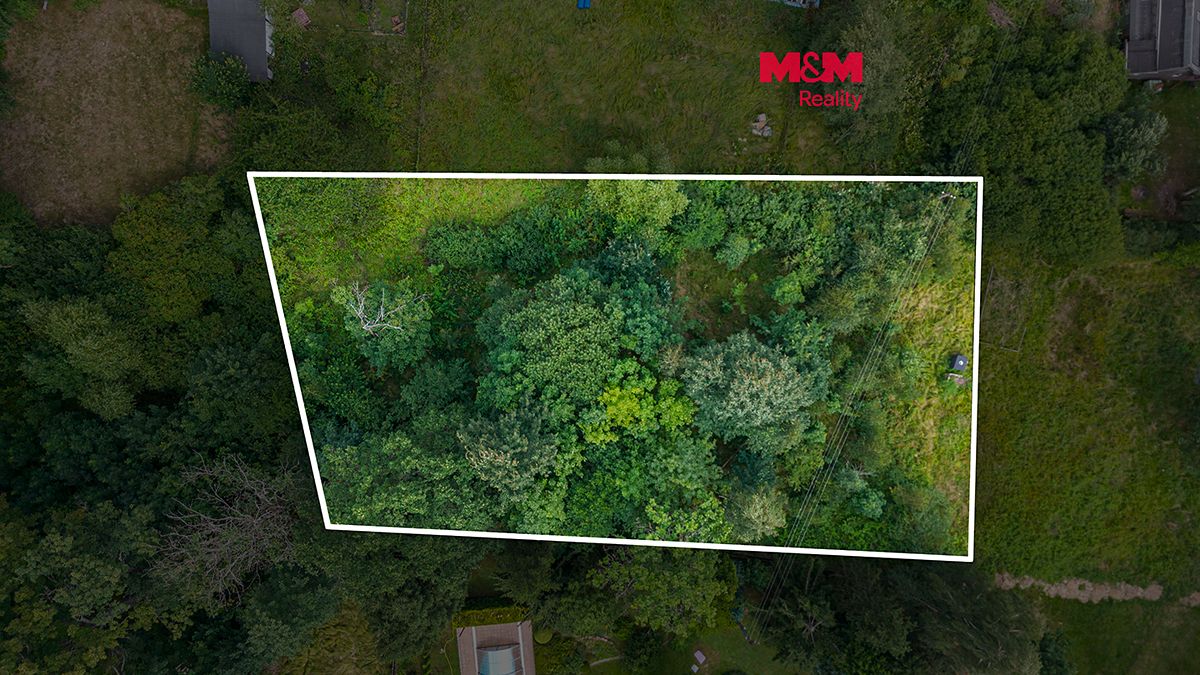 Prodej stavebního pozemku 1596 m², Staré Křečany – fotka 1 z 3