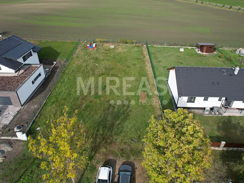Prodej stavebního pozemku 880 m², Březno – náhled fotky 1