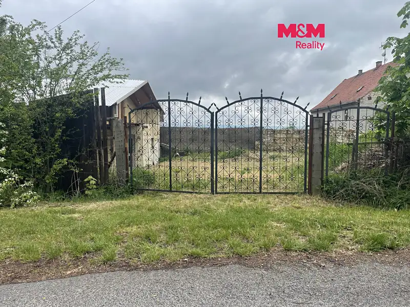 Prodej stavebního pozemku 413 m², Měcholupy – náhled fotky 1