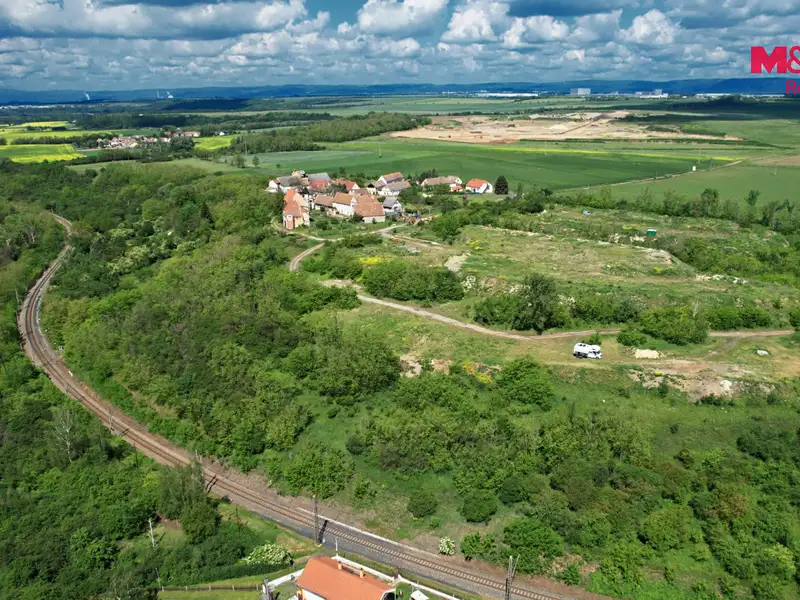 Pronájem stavebního pozemku 24000 m², Postoloprty – náhled fotky 2
